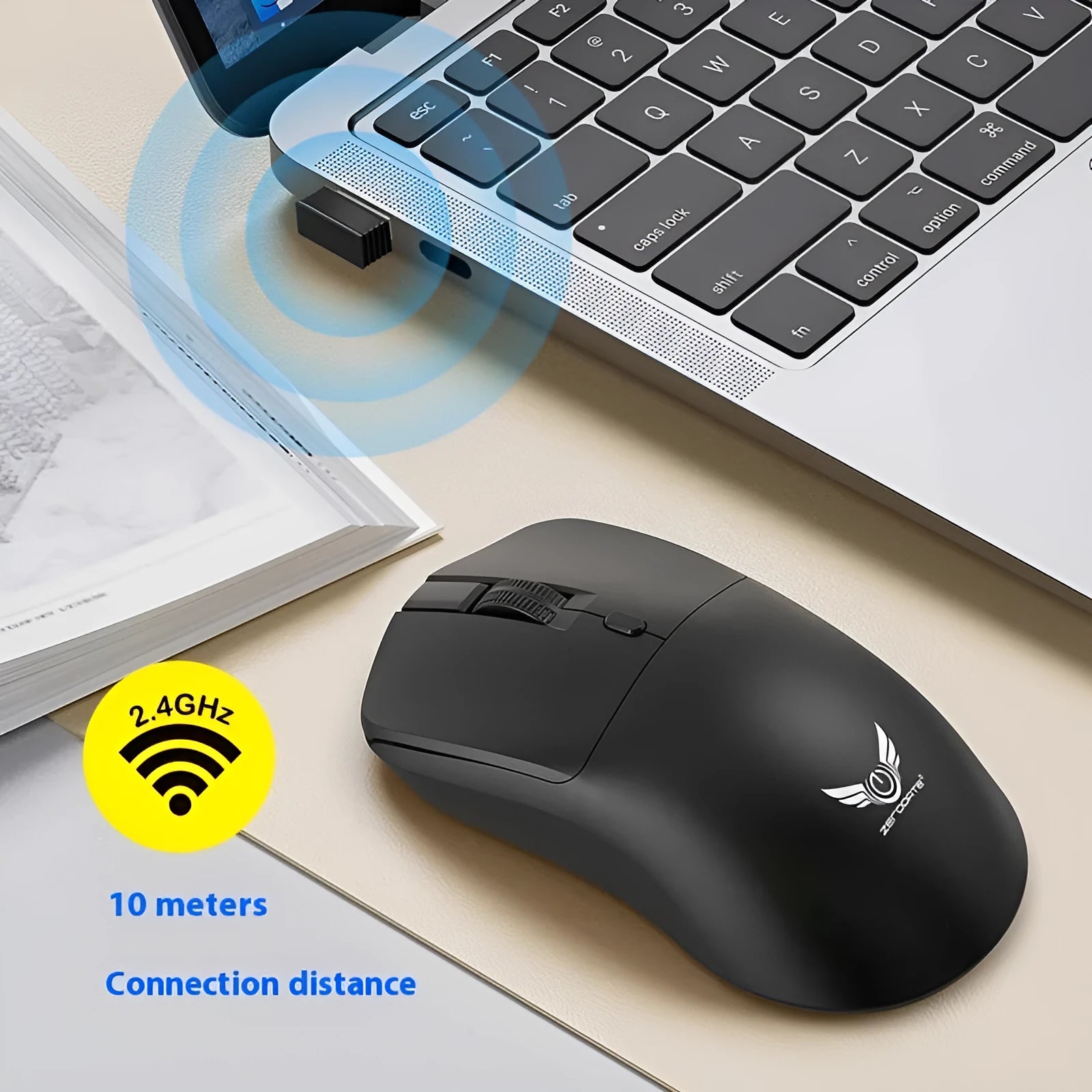 Black wireless laptop mouse with three-gear audio button shown on desk