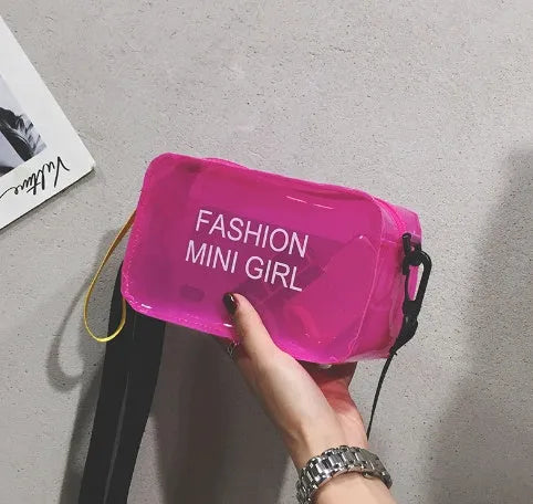 A transparent square jelly crossbody bag with a single adjustable shoulder strap.