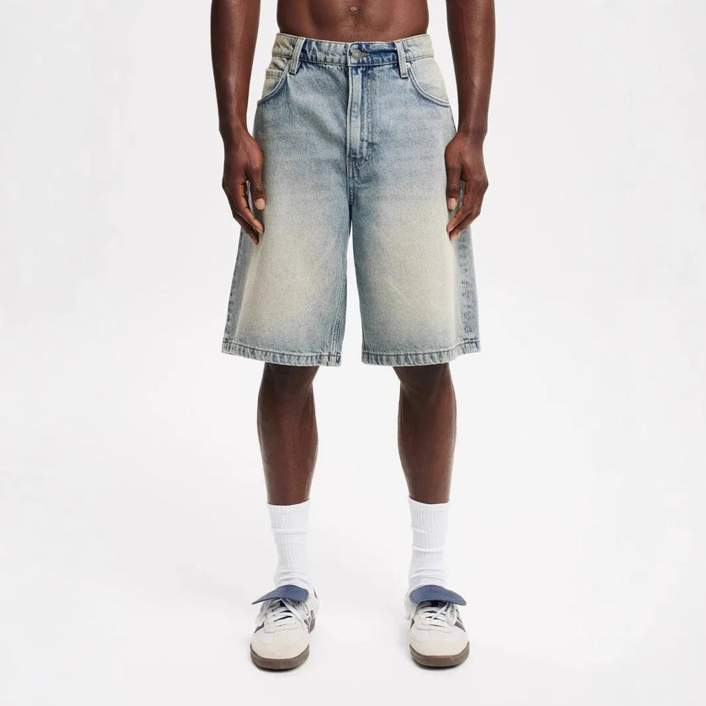 Men's loose fit straight leg jeans in light blue, black and grey cotton denim