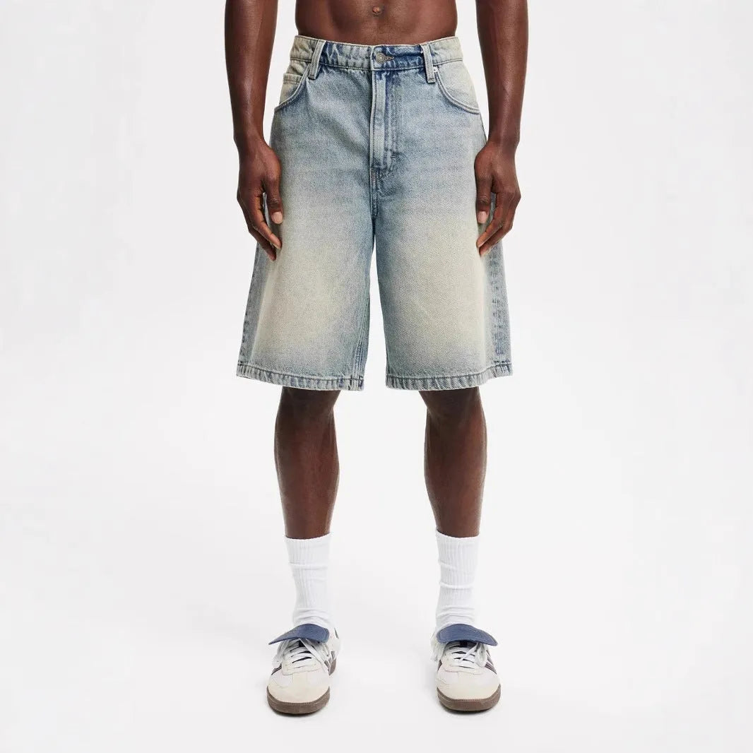 Men's loose fit straight leg jeans in light blue, black and grey cotton denim