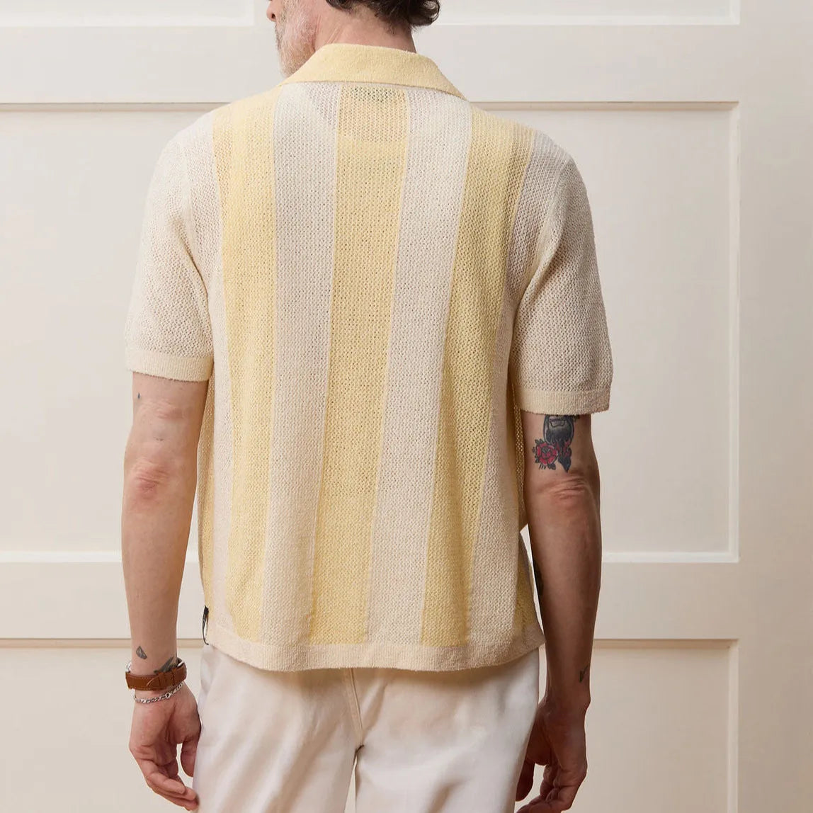 Yellow asymmetrical Tencel polo shirt with hollow-out detailing and short sleeves