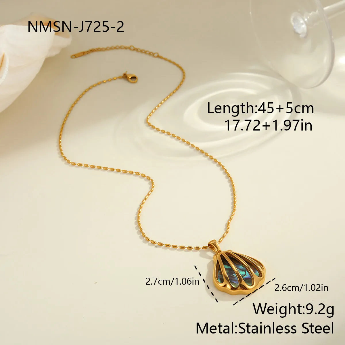 Gold plated stainless steel scallop shell stud earrings and necklace set with fan-shaped geometric design