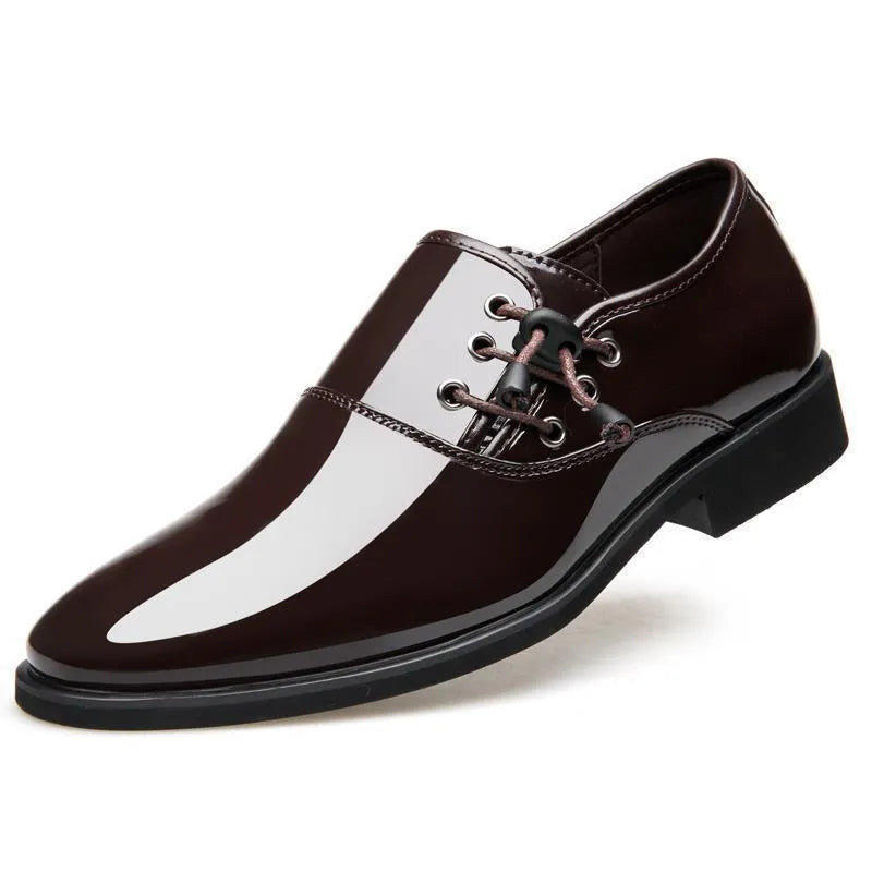 Men's black and brown formal slip-on shoes with round toe and square heel on a rubber sole.