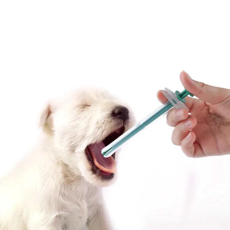 Two pet pill shooters with soft silicone tips for cat and dog medication feeding