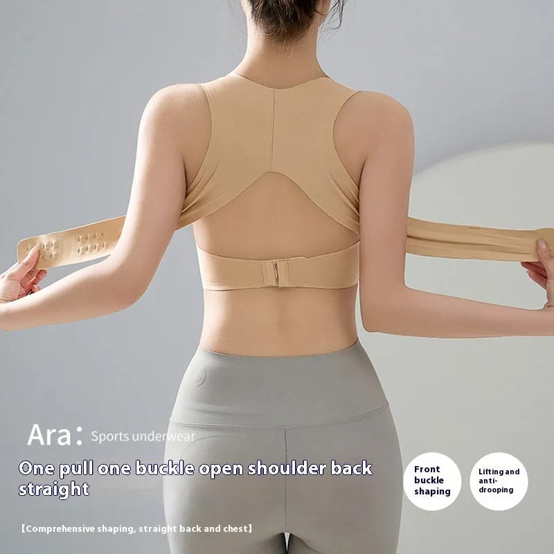 Women's front buckle yoga bra in black, showing back shaping design and adjustable front closure.