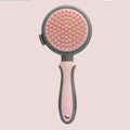 Double-sided cat brush with release button and flea comb for pet grooming