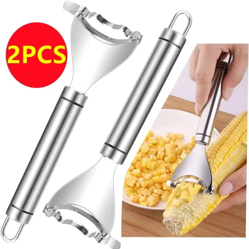 Stainless steel corn planer with silver finish on a kitchen surface measuring 18cm long