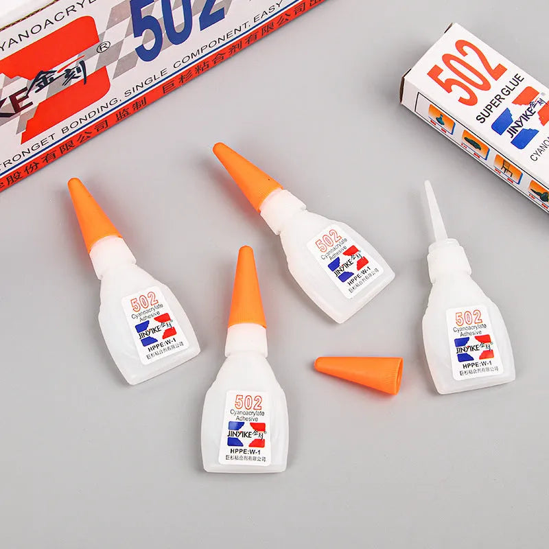 Tube of specialised shoe repair glue for strong, permanent adhesive patches on footwear.