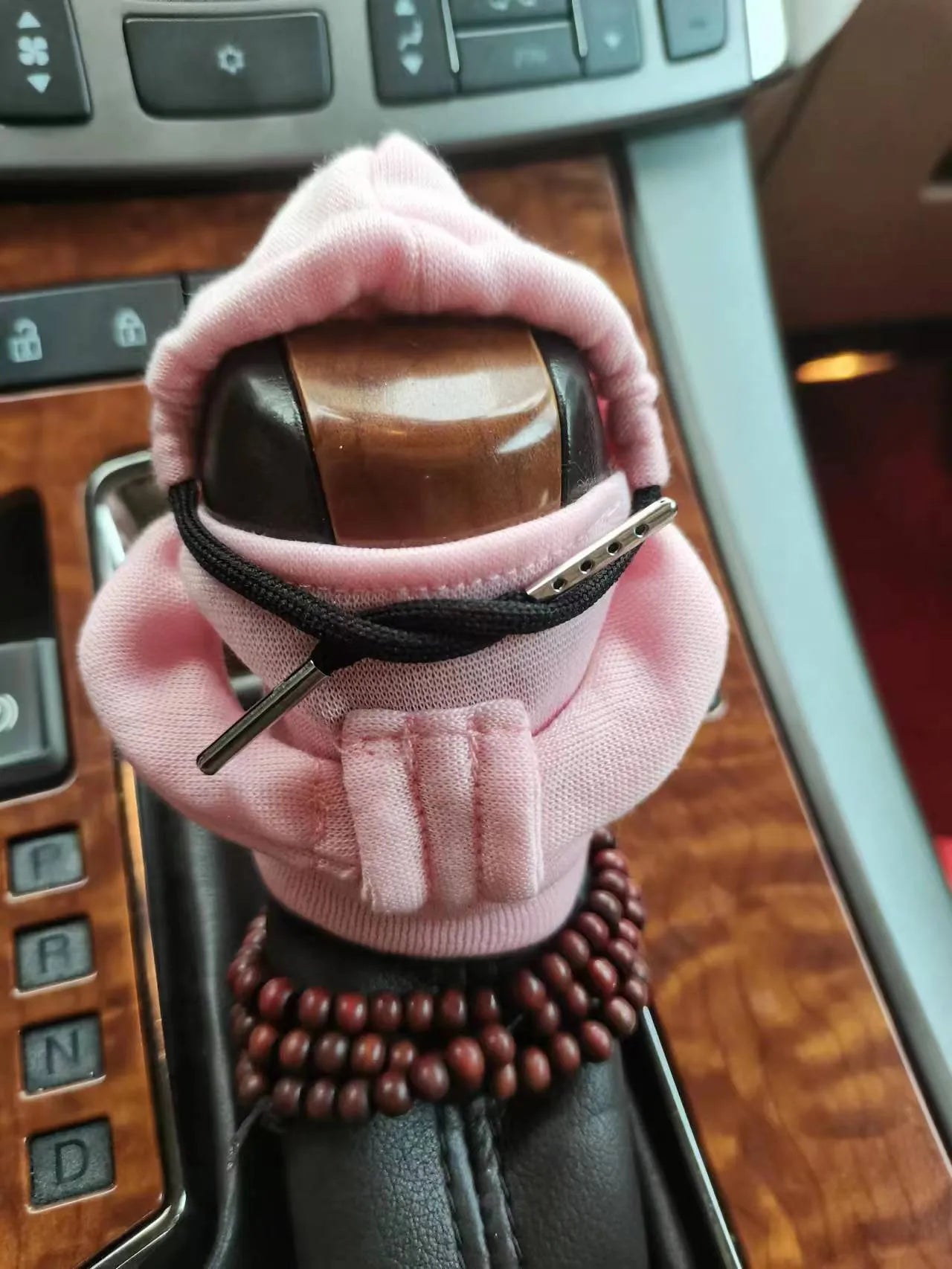 Dutch velvet car gear handle sleeve in multiple colour options on a car gear stick