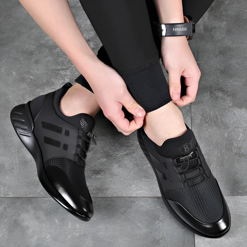 Men's black casual height increasing shoes in leather, Lycra and mesh with an invisible chunky heel.
