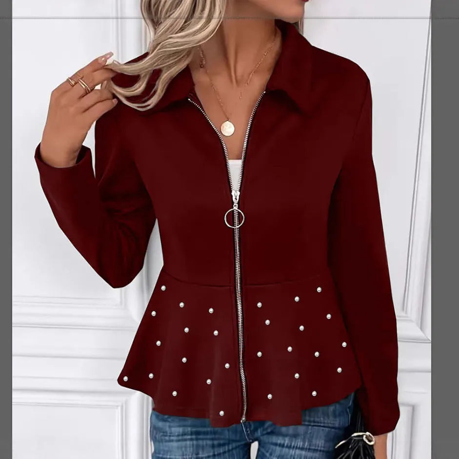 Women's solid colour coat with beaded zipper and ruffled hem detail