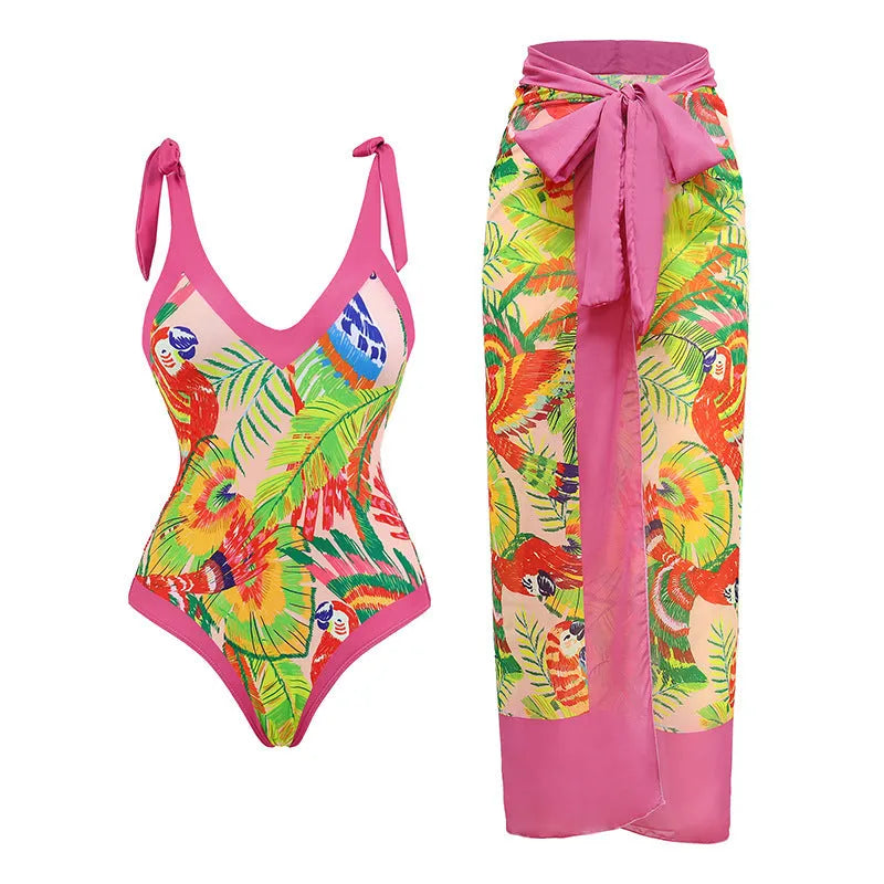 Retro floral print one-piece swimsuit with V-neck, covered belly design and thin skirt in pink colour