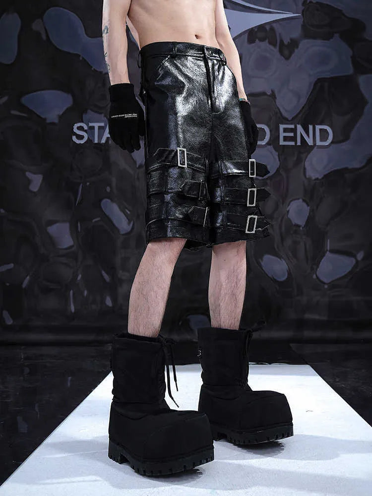 Men's black PU leather casual cropped shorts with an elasticated waistband.