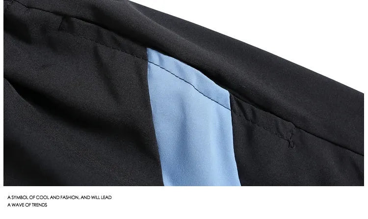 Men's black quick-drying sports shorts with elastic waistband and straight-leg loose fit