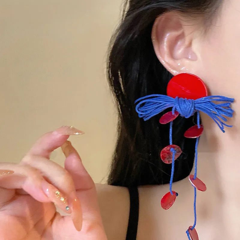 Handcrafted geometric women's earrings with cloth material and silver needle-blue resin flower elements