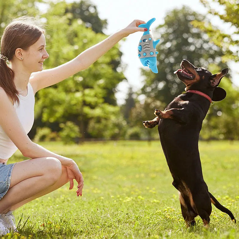Blue shark-tooth textured dog teething toy with ventilation channels for puppy oral health
