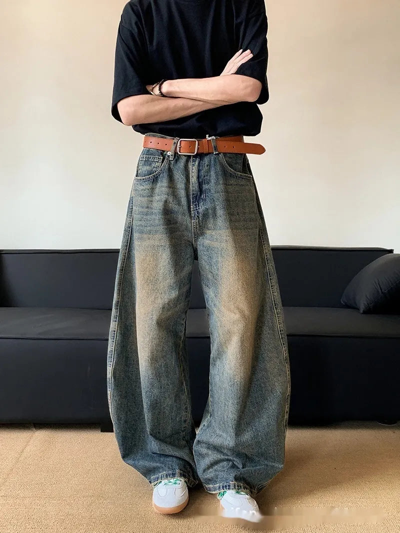 Men's retro blue distressed denim jeans with wide-leg cut and micro elasticity fabric