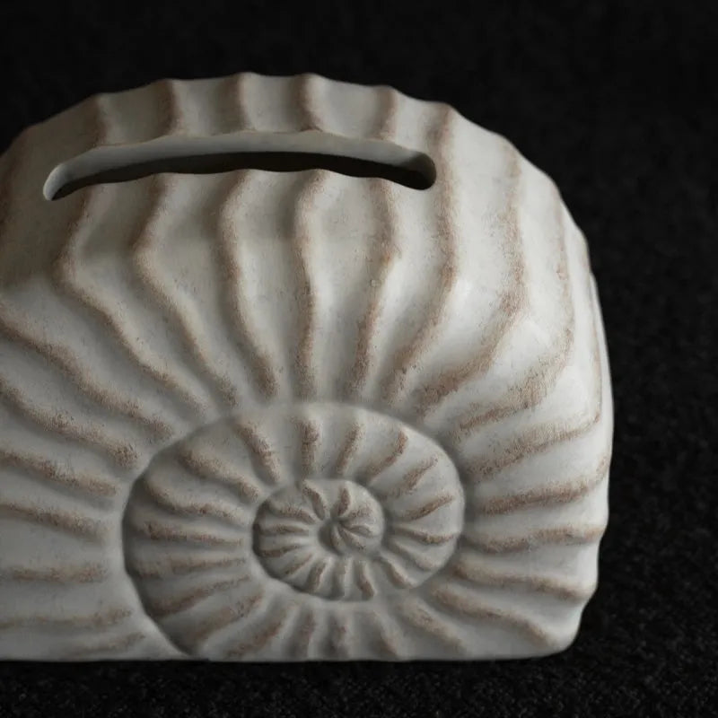Creative Conch Ramble coloured resin decorative tissue box with modern simplicity design.