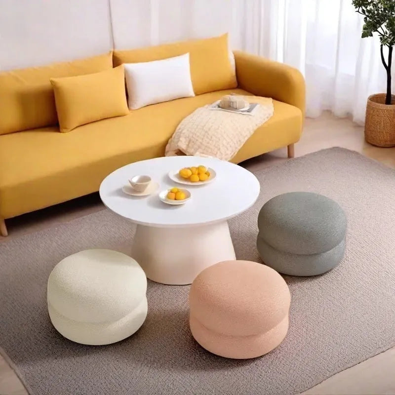 Small cream style round stool with skin-friendly lamb high elastic sponge fill in a living room