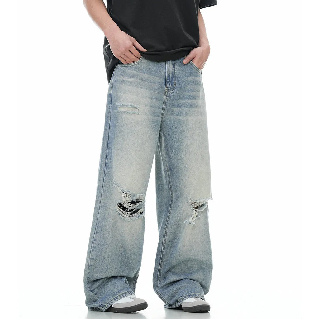 Blue straight-leg men's jeans with ripped detailing and retro summer styling