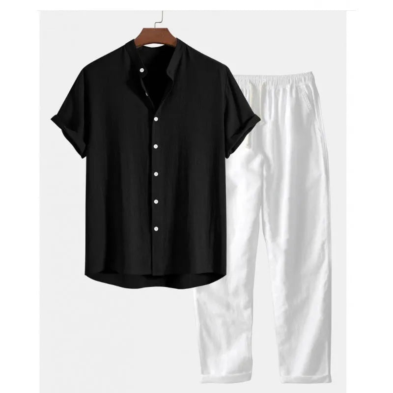 Man wearing a loose casual short-sleeve linen-look shirt and matching trousers in a solid colour.