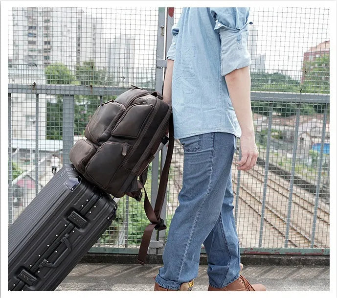 Dark brown retro genuine leather backpack for men with a 17-inch laptop compartment.