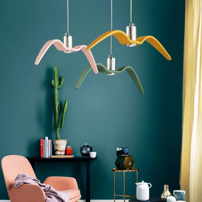 Nordic style Macaron shaped personalised LED chandelier ceiling light in a selected colour.