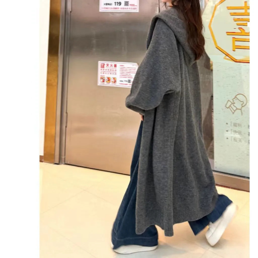 Korean style long hooded cardigan for women in a wool blend, shown in beige, loose below-knee fit.