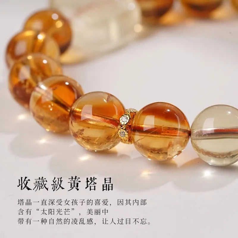 Women's ethnic style bracelet with a carved 10mm citrine crystal geometry bead.
