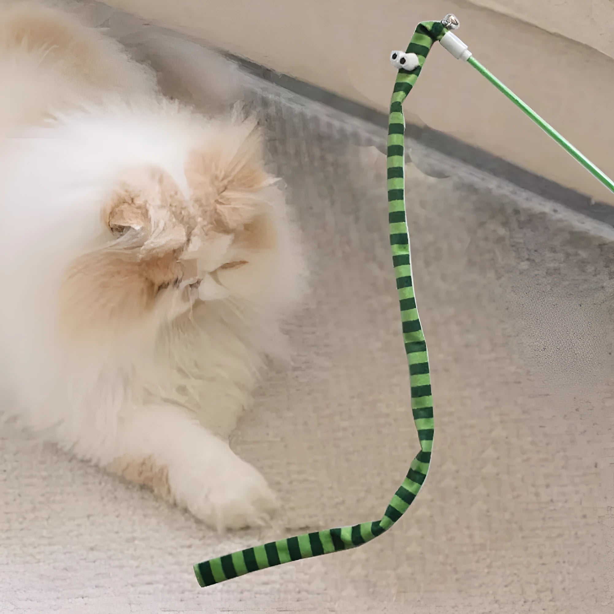 Cat wand toy with polycarbonate pole and long plush strip in green, orange, or rainbow