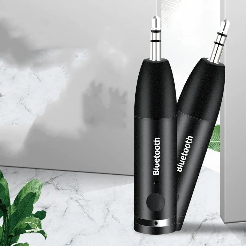 Black Bluetooth AUX audio receiver for car stereo with USB cable