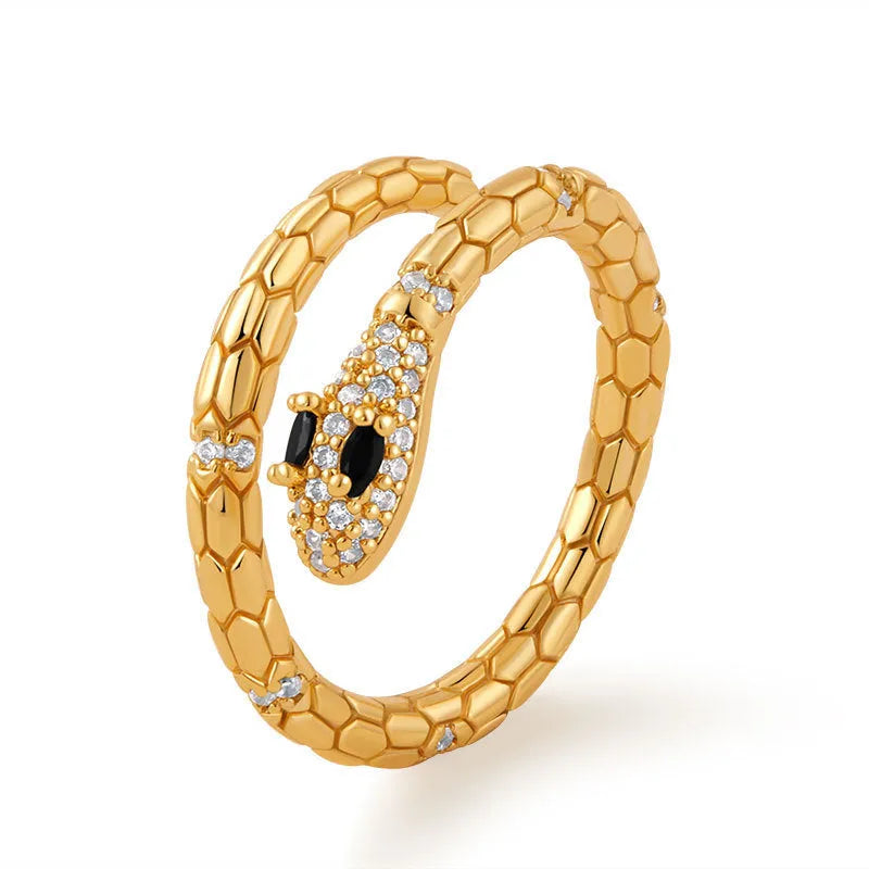 Snake-shaped adjustable copper ring with gold colour plating and diamond treatment