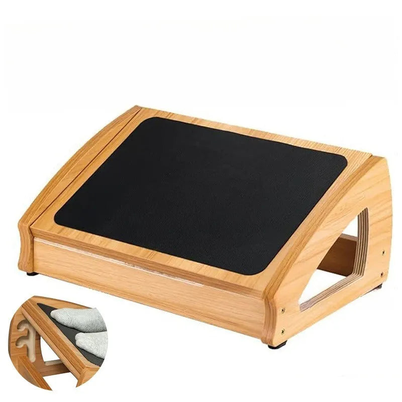 Adjustable bamboo office desk footstool in natural wood colour on a floor.