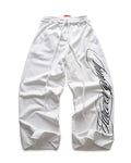 Design printing men's smart trousers in black, loose fit polyester with mid waist and micro elasticity