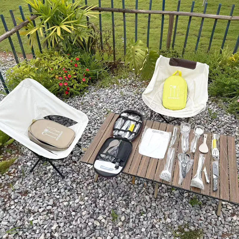 Portable picnic kitchenware storage bag containing 12 pieces of stainless steel cutlery and utensils.
