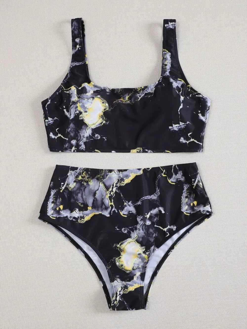 Women's marble print high-waist bikini set in blue tie-dye pattern for swimming.