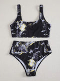 Women's marble print high-waist bikini set in blue tie-dye pattern for swimming.