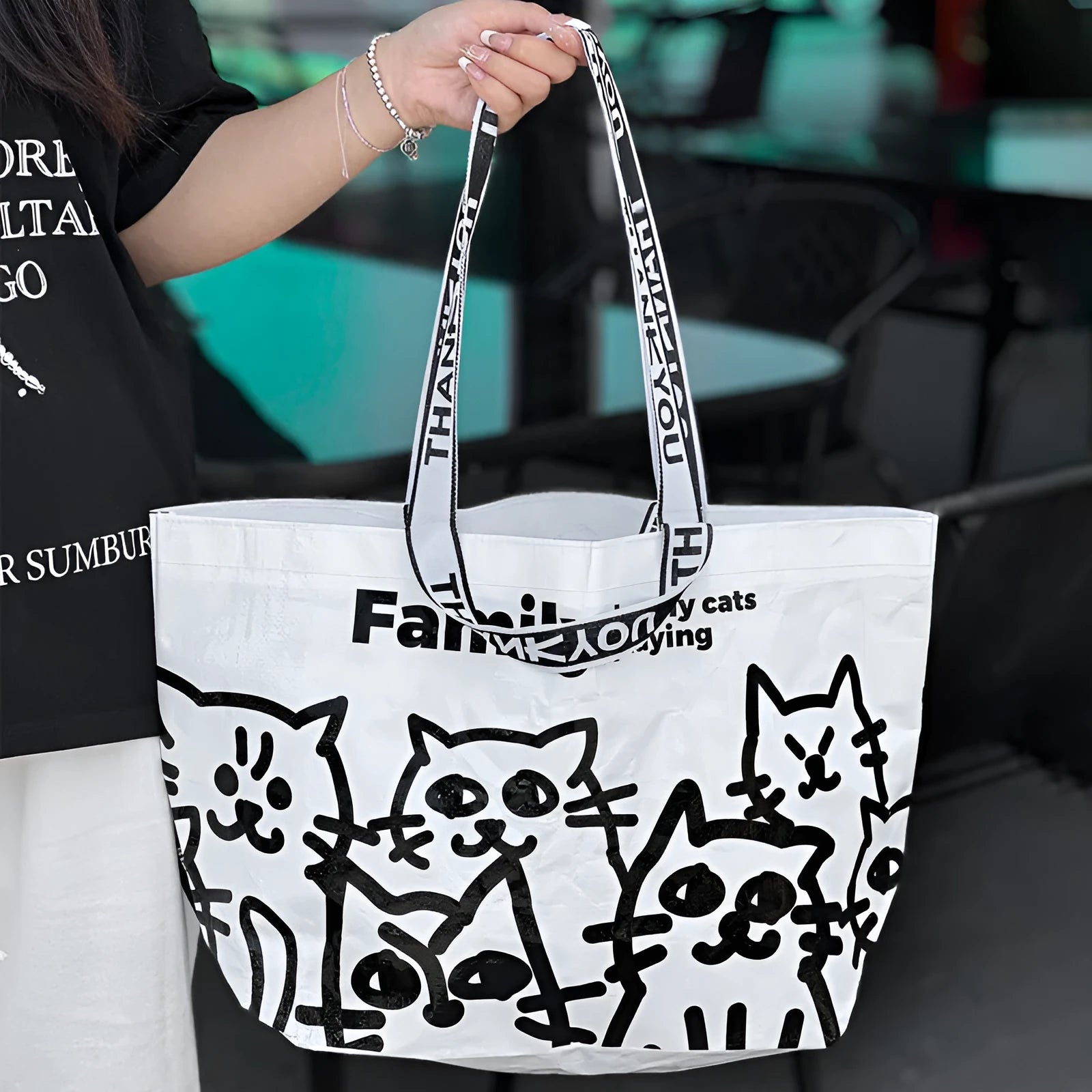 Waterproof PP woven handbag with colour printing for portable use.