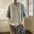 Men's grey t-shirt with raised letter pattern, short sleeves, loose fit
