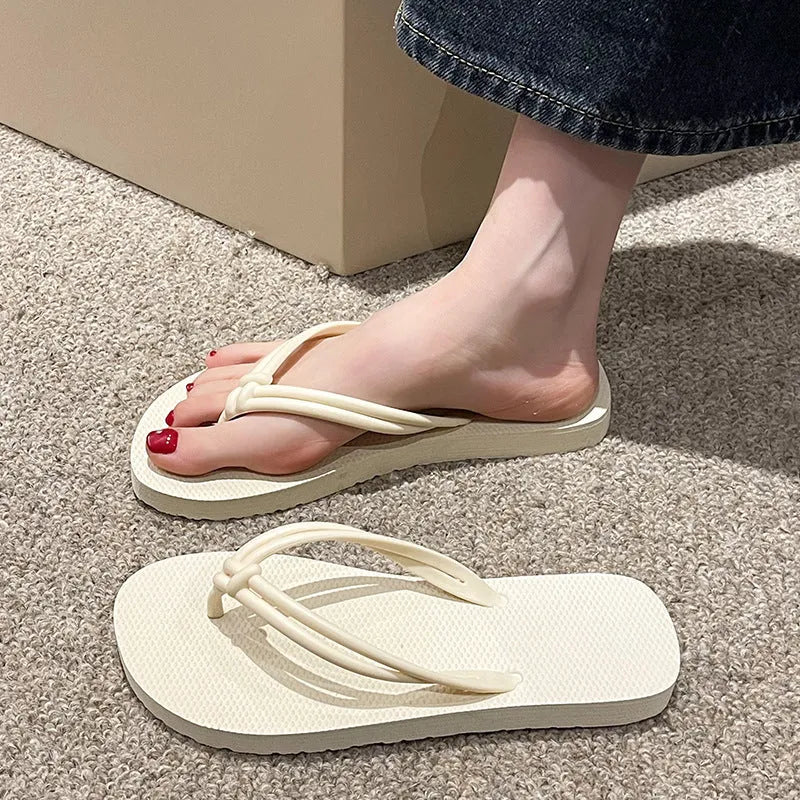 Men's PVC flip flops in a toe-covering style with a non-slip sole, shown in one of the available colours