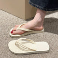 Men's PVC flip flops in a toe-covering style with a non-slip sole, shown in one of the available colours