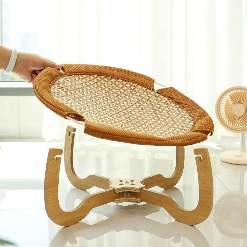 Brown woven rattan raised pet bed for cats and dogs, measuring 46cm square.