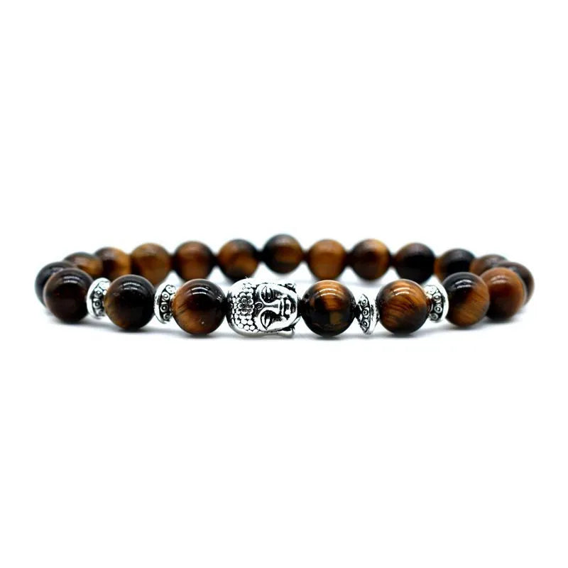 Unisex adjustable bracelet with a 19mm Buddha head charm in tiger eye stone.