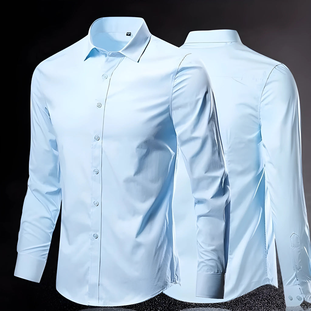 Man wearing a loose-fit long-sleeve linen shirt in a light colour, showing the relaxed silhouette and textured fabric.