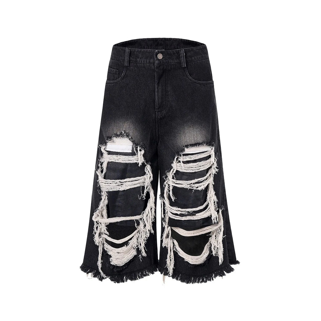Black women's cropped wide-leg jeans with mid-high waist and ripped patch detail