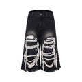 Black women's cropped wide-leg jeans with mid-high waist and ripped patch detail