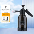 Black hand-held 2 litre spray bottle with two nozzles for garden watering and car washing