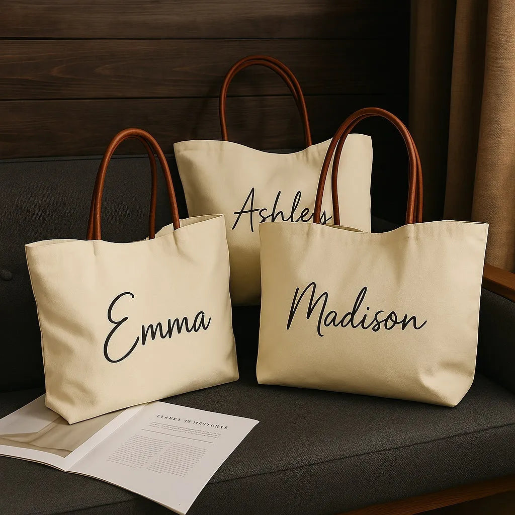 Beige white canvas tote bag with cotton handles, showing interior patch pocket and exterior zipper pocket.