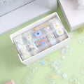 Five rolls of transparent adhesive tape with Midsummer Daisy cartoon decoration, each 1.5cm wide