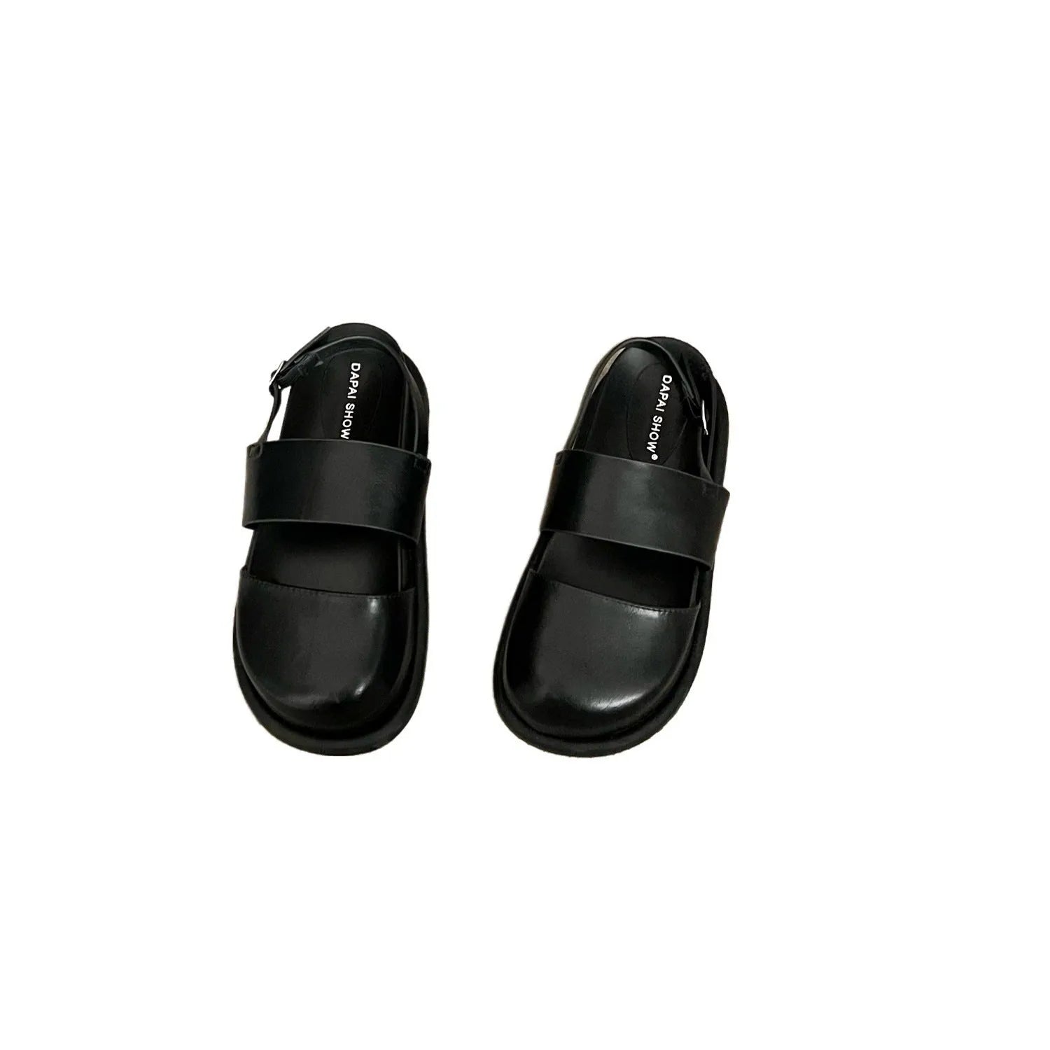 Retro closed toe sandals with an ankle buckle in apricot colour on a white background